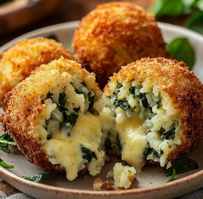 Croquetas de arroz y espinacas con corazón de queso fundido
